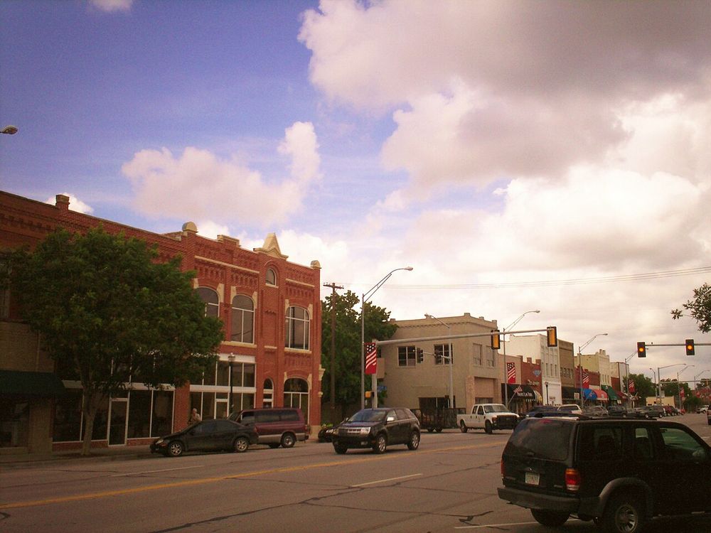 Main Street in downtown Broken Arrow, Oklahoma, lined with historic brick buildings